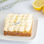Tarte citron meringuée Maison Vatelier avec meringue italienne pochée et zestes de citron.