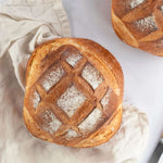 Boule Blanche Maison Vatelier, pain artisanal doré avec scarification en croisillons.